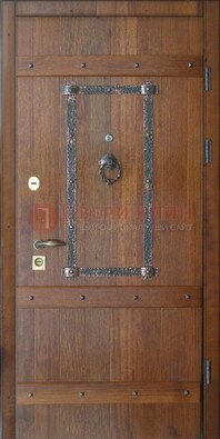 Темная стальная дверь с массивом дуба с ковкой ДМД-37 в Иваново