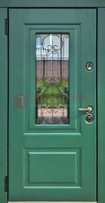 Зеленая металлическая дверь со стеклом и ковкой ДСК-113 в Иваново