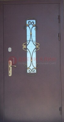 Металлическая дверь со стеклом и ковкой ДСК-77 в Иваново